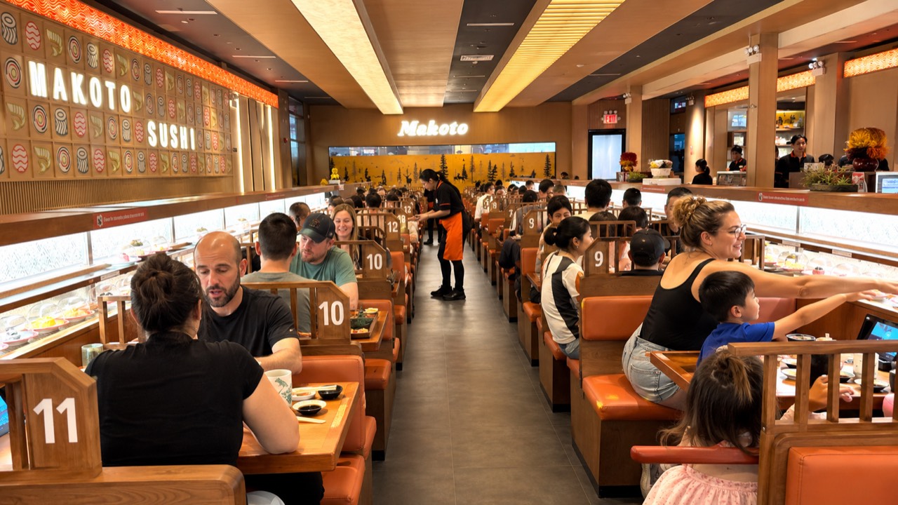 Inside the Makoto dining room on Hylan Blvd Guests dining in the booth-lined revolving sushi dining room at Makoto in Staten Island NY