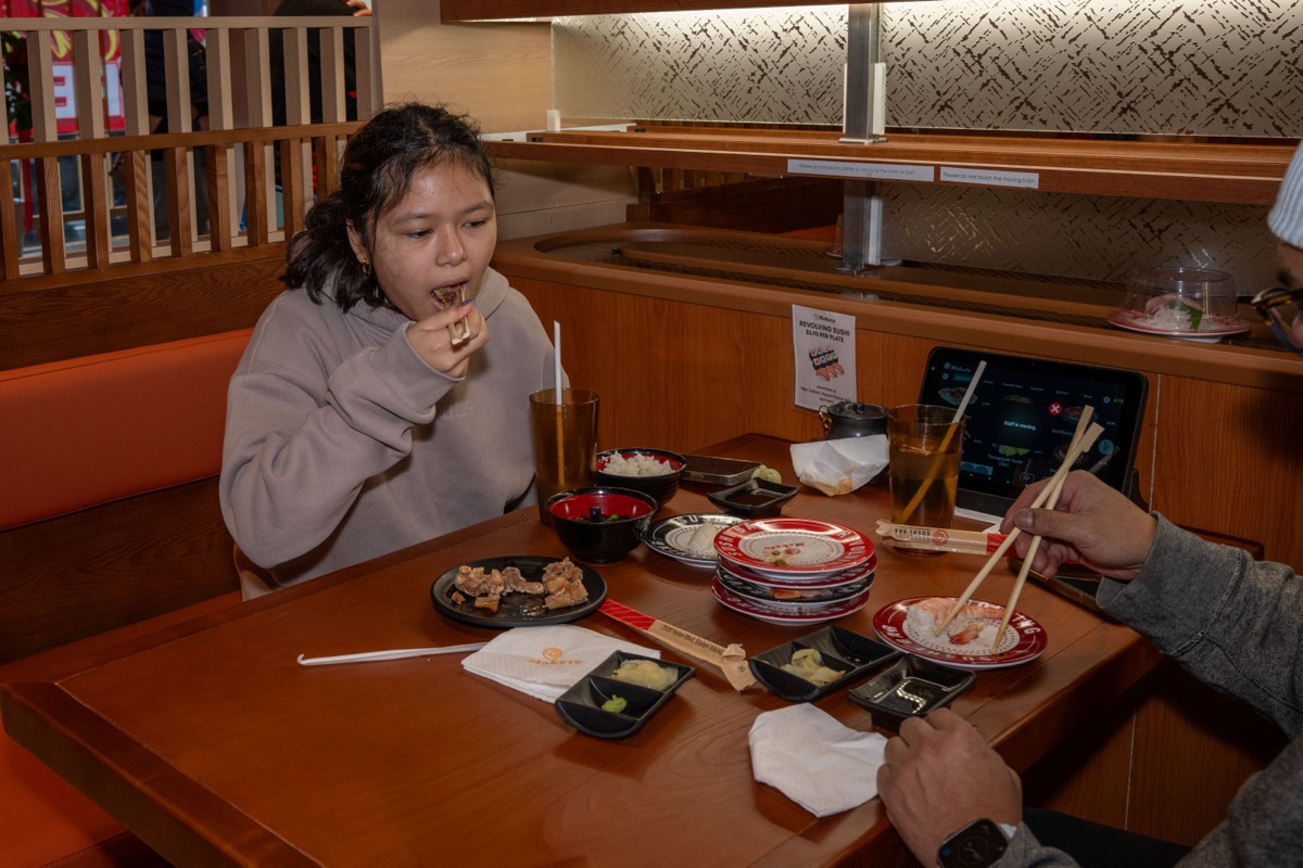 Ellie Gapud, 11, dines at Makoto Revolving Sushi Bar and Bubble Tea in New Dorp, Staten Island