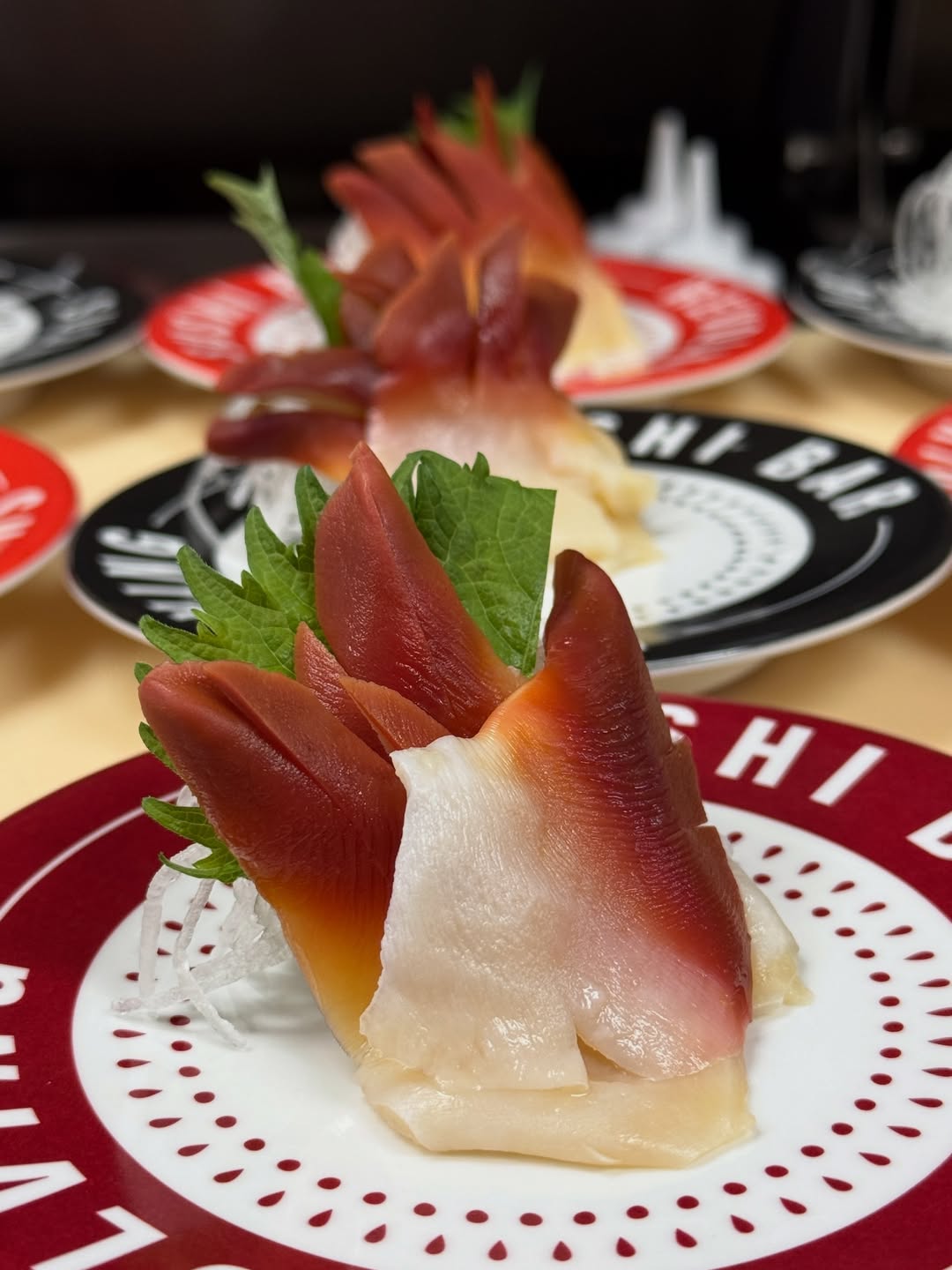 Fresh sashimi platter with yellowtail tuna salmon at Makoto